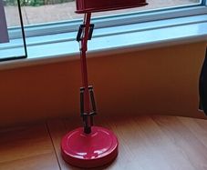 red adjustable study lamp