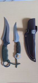 Two knives in a holster, for hunting, meat, tourism, camping.