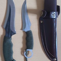Two knives in a holster, for hunting, meat, tourism, camping.
