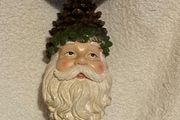 Pine Cone Santa candle holder. H x 26cm, W x 8cm.New