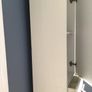 Tall white storage unit with drawer Image 5