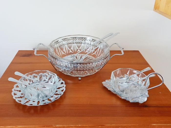 Vintage glass serving bowls sitting on chrome finish ornated frame/plates glass made in France by Reims, spoons in Sheffield