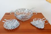 Vintage glass serving bowls sitting on chrome finish ornated frame/plates glass made in France by Reims, spoons in Sheffield