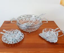 Vintage glass serving bowls sitting on chrome finish ornated frame/plates glass made in France by Reims, spoons in Sheffield
