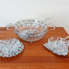 Vintage glass serving bowls sitting on chrome finish ornated frame/plates glass made in France by Reims, spoons in Sheffield