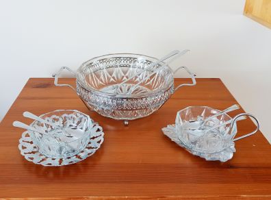 Vintage glass serving bowls sitting on chrome finish ornated frame/plates glass made in France by Reims, spoons in Sheffield