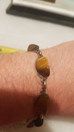 tiger eye bracelet,,good condition,buyer collects or pays postage, thank you, take as is,see pictures for condition