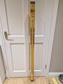 White wooden curtain pole
