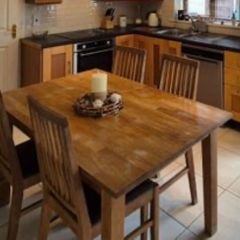 Solid oak table and four chairs