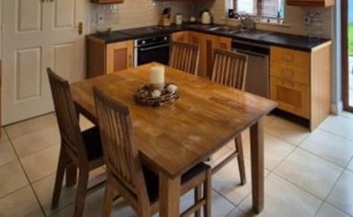Solid oak table and four chairs