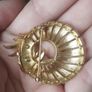 Vintage gold tone brooch. Image 7