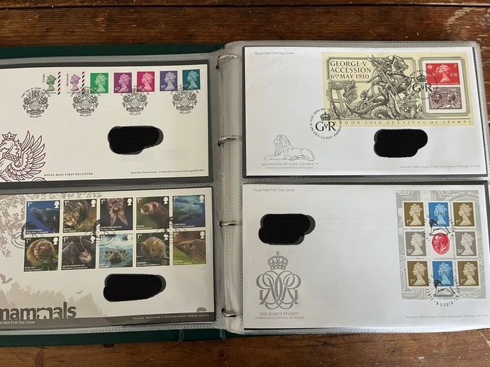 Collection of  77 UK First Day Cover stamps 2010 to 2013 in album