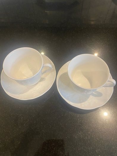 Wedgwood strawberry and vine cups and saucers
