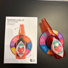 Spin the bottle party game