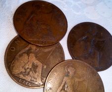 2 x 1916 copper pennies.