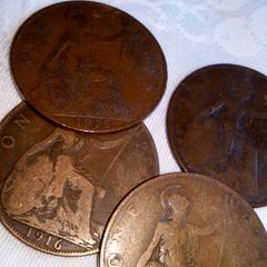 2 x 1916 copper pennies.