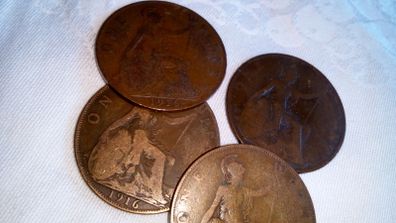 2 x 1916 copper pennies.