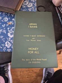 Money for all book with bank note