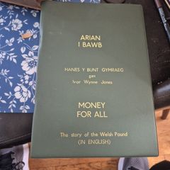 Money for all book with bank note