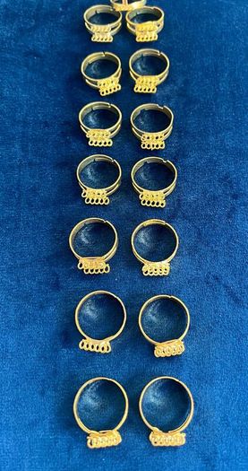 Set of 14 gold tone adjustable rings