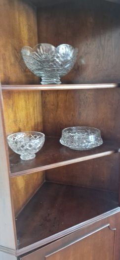 mahogany coffee table and 6 chairs, corner cabinet , 3 crystal bowls