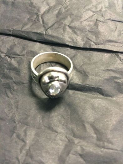 Silver ring with white  stone