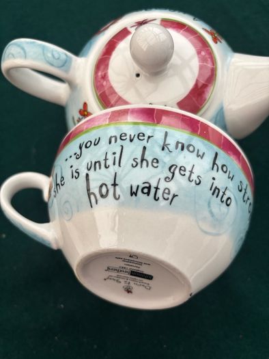 A Ceramic One Cup Teapot.