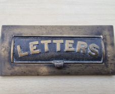 Antique brass letter plate