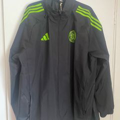 Black and neo green Adidas Celtic all weather jacket