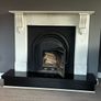Marble fireplace surround and plinth with solid fuel stove Image 2
