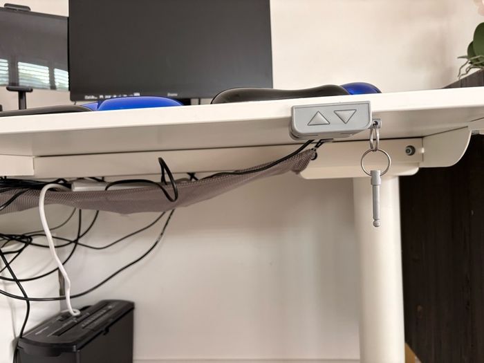 Electric sit to stand desk,chair and cabinet.