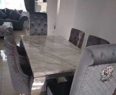 Dining table and 6 grey velvet chairs