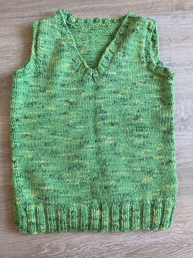 2 hand knitted boys body warmers
