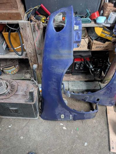 E11 Toyota Corolla front wings