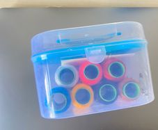 Compact Sewing Kit with Storage Case Includes multi-color thread spools, measuring tape, snips, buttons, and basic tools in a clear plastic organizer. Great condition, clean, and perfect for everyday household repairs or travel!