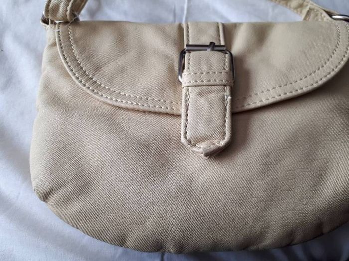 New cross over bag tag attached