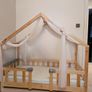 Toddler house bed with mattress. Perfect condition. Image 2