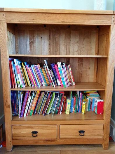 Oak bookcase with drawers