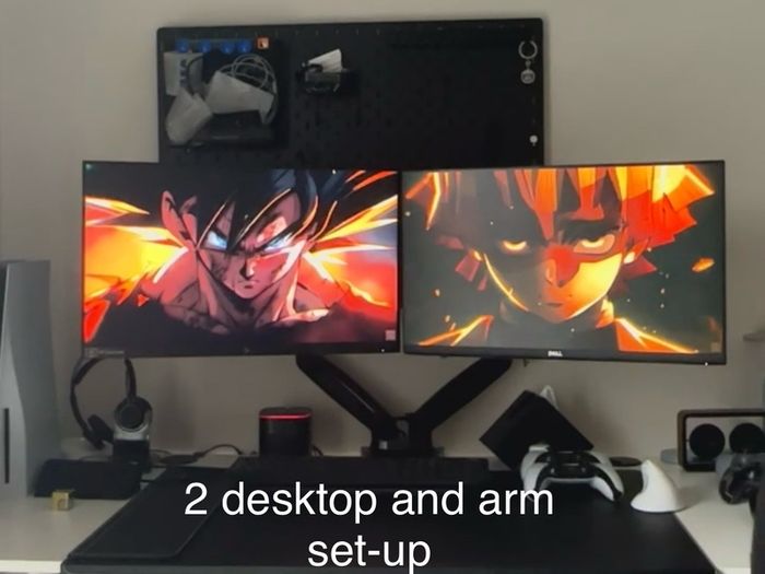 Complete desktop setup- 2 desktops, arm that holds 2 desktops and accessories.