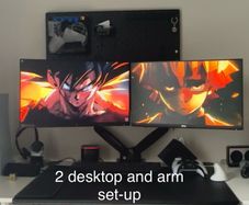 Complete desktop setup- 2 desktops, arm that holds 2 desktops and accessories.