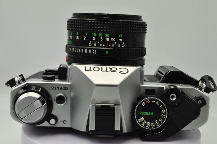 Canon AE-1 Program Silver/ Chrome 35mm SLR Film Camera with fast Canon FD 50mm f1. 8 FDn, Recently FULLY SERVICED and in Good Condition.