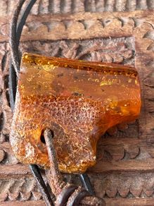 Raw Amber on leather