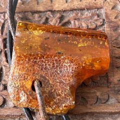 Raw Amber on leather