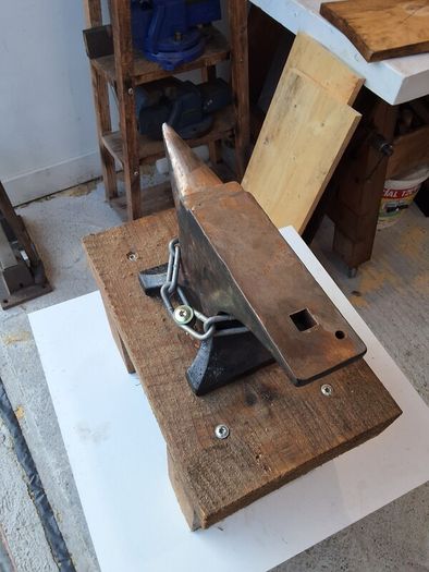 anvil on timber stand