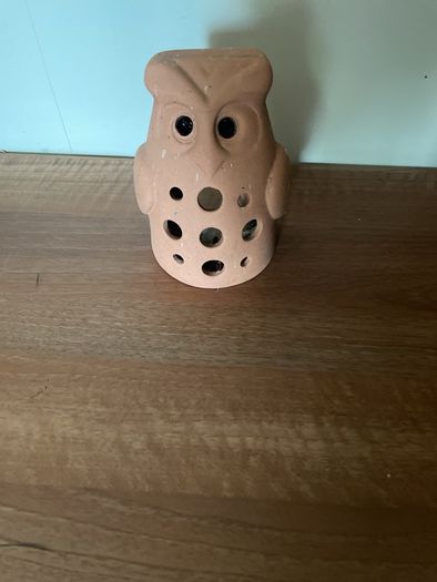 Terracotta owl garden ornament