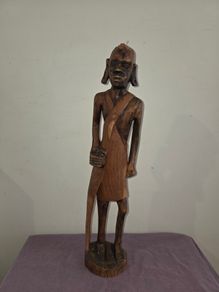 Tall carved wooden African Statue