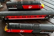 hornby train This is a Hornby OO gauge model of a British Rail Class 43 InterCity 125 High Speed Train (HST) power car in Virgin Trains livery. It also includes a coach and a dummy engine. Price is for all 3