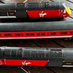 hornby train This is a Hornby OO gauge model of a British Rail Class 43 InterCity 125 High Speed Train (HST) power car in Virgin Trains livery. It also includes a coach and a dummy engine. Price is for all 3