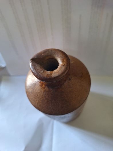 Antique stoneware ink bottle with salt glaze finish and pouring spout