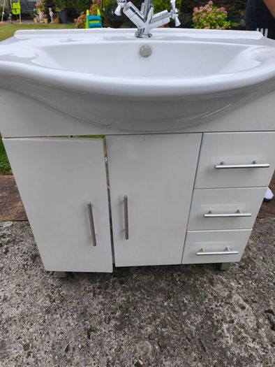 sink with mixer tap and cabinet